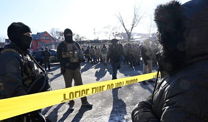 MINNEAPOLIS, MINNESOTA - JANUARY 24: Federal agents block off the scene of a shooting as crowds gather on January 24, 2026 in Minneapolis, Minnesota. Agents allegedly shot a protestor amid a scuffle to arrest him. The Trump administration has sent a reported 3,000 federal agents into the area, with more on the way, as they make a push to arrest undocumented immigrants in the region. (Photo by Stephen Maturen/Getty Images)