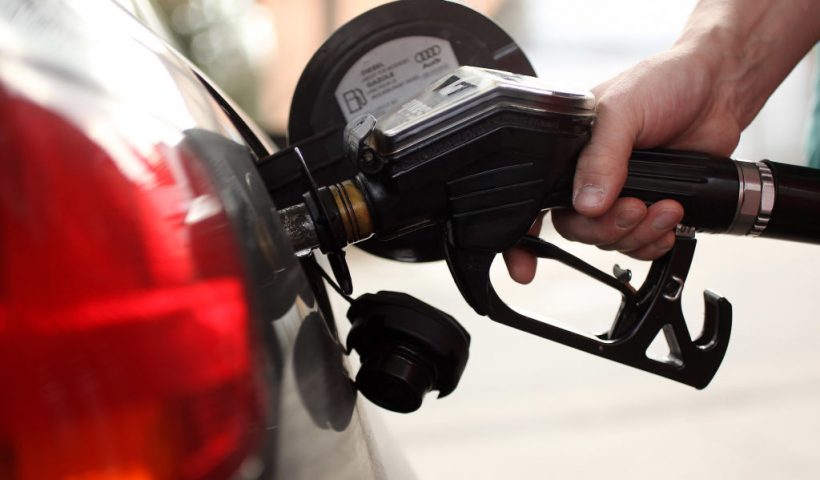 BERLIN - MARCH 23: A gasoline station attendant pumps diesel into a car at a filling station on March 23, 2010 in Berlin, Germany. German President Horst Koehler said on Sunday higher petrol prices is the surest means to convince traditionally car-loving Germans to seek more environmentally-friendly alternatives, and his comment has already sparked the ire of the automobile lobby. (Photo Illustration by Sean Gallup/Getty Images)