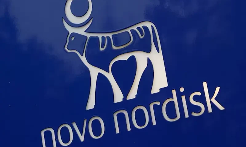The logo of pharmaceutical company Novo Nordisk is displayed in front of its offices in Bagsvaerd, on the outskirts of Copenhagen, Denmark, December 3, 2025. REUTERS/Tom Little/File Photo