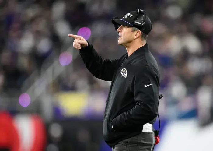 Baltimore Ravens head coach John Harbaugh gestures during the first half of an NFL football game against the New England Patriots, Sunday, Dec. 21, 2025, in Baltimore. (AP Photo/Nick Wass)