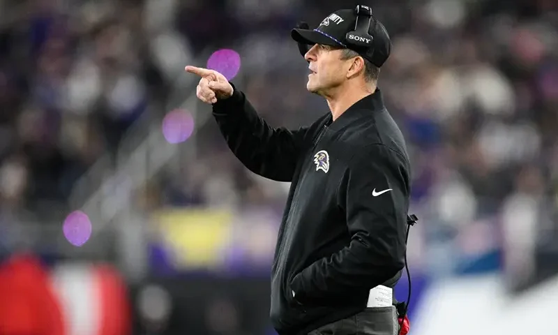 Baltimore Ravens head coach John Harbaugh gestures during the first half of an NFL football game against the New England Patriots, Sunday, Dec. 21, 2025, in Baltimore. (AP Photo/Nick Wass)