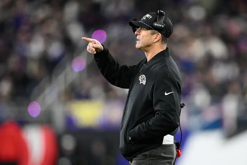Baltimore Ravens head coach John Harbaugh gestures during the first half of an NFL football game against the New England Patriots, Sunday, Dec. 21, 2025, in Baltimore. (AP Photo/Nick Wass)