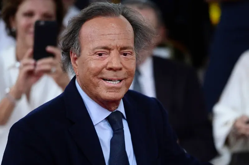 Spanish singer Julio Iglesias smiles during his star unveiling ceremony at the Walk of Fame in San Juan, Puerto Rico, Thursday, Sept. 29, 2016. (AP Photo/Carlos Giusti, file)