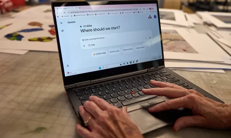 Art teacher Joyce Hatzidakis uses the AI tool Google Gemini in her high school classroom Thursday, Jan. 22, 2026, Riverside, Calif. (AP Photo/Damian Dovarganes)