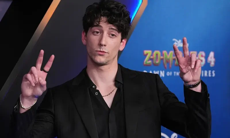 Milo Manheim, a cast member in “Zombies 4: Dawn of the Vampires,” arrives at the premiere of the film July 8, 2025, at El Capitan Theatre in Los Angeles. (AP Photo/Chris Pizzello, File)