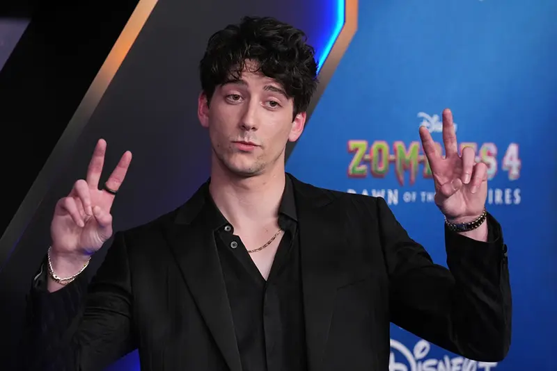 Milo Manheim, a cast member in “Zombies 4: Dawn of the Vampires,” arrives at the premiere of the film July 8, 2025, at El Capitan Theatre in Los Angeles. (AP Photo/Chris Pizzello, File)