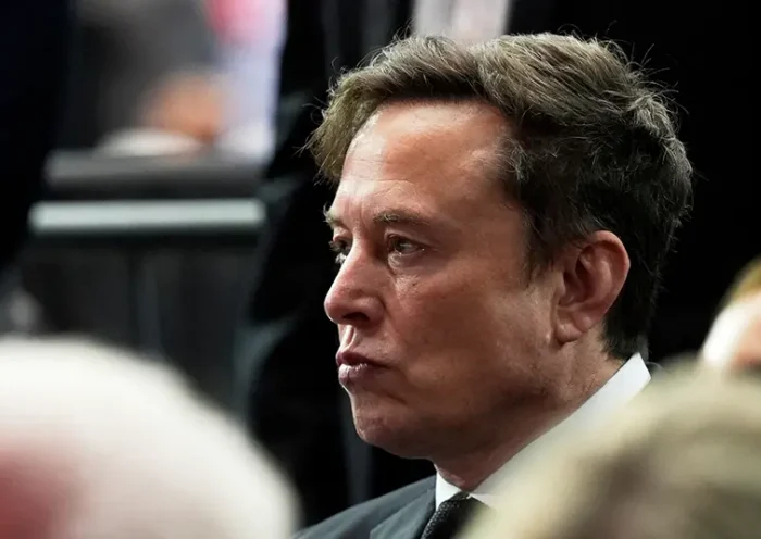 Elon Musk attends a memorial for conservative activist Charlie Kirk, Sunday, Sept. 21, 2025, at State Farm Stadium in Glendale, Ariz. (AP Photo/Julia Demaree Nikhinson, File)