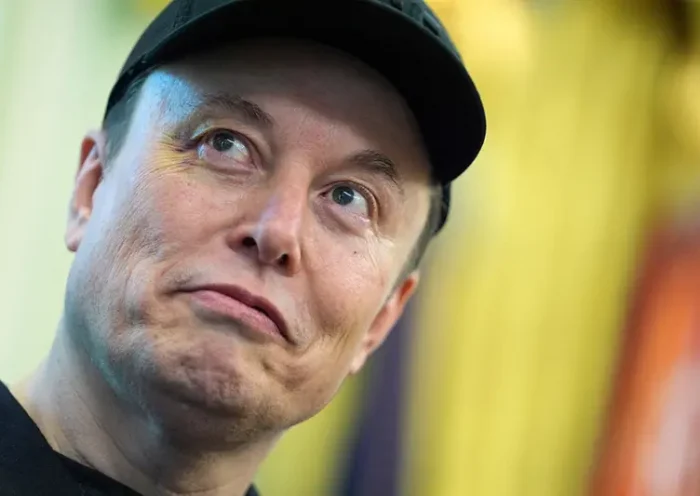 Elon Musk listens as President Donald Trump speaks during a news conference in the Oval Office of the White House, May 30, 2025, in Washington. (AP Photo/Evan Vucci, File)