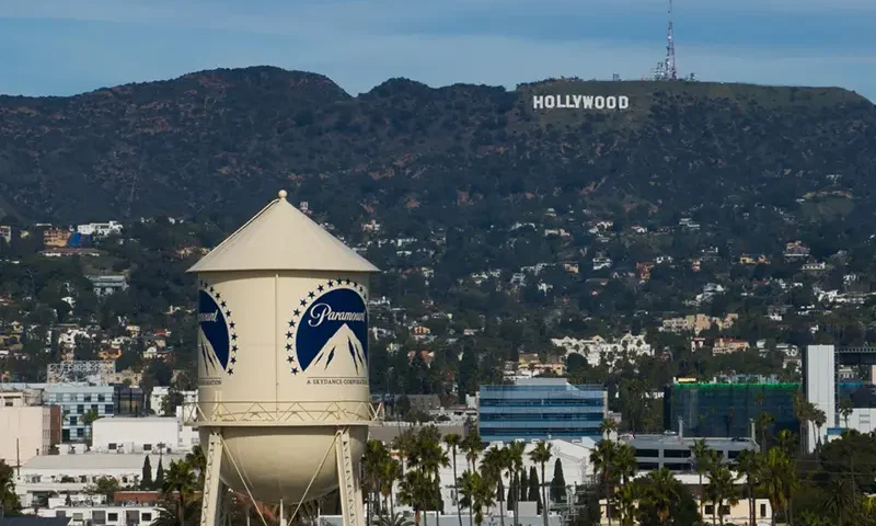 The Paramount Pictures water tower is seen in Los Angeles, Thursday, Dec. 18, 2025, with the Hollywood sign in the distance. (AP Photo/Jae C. Hong)