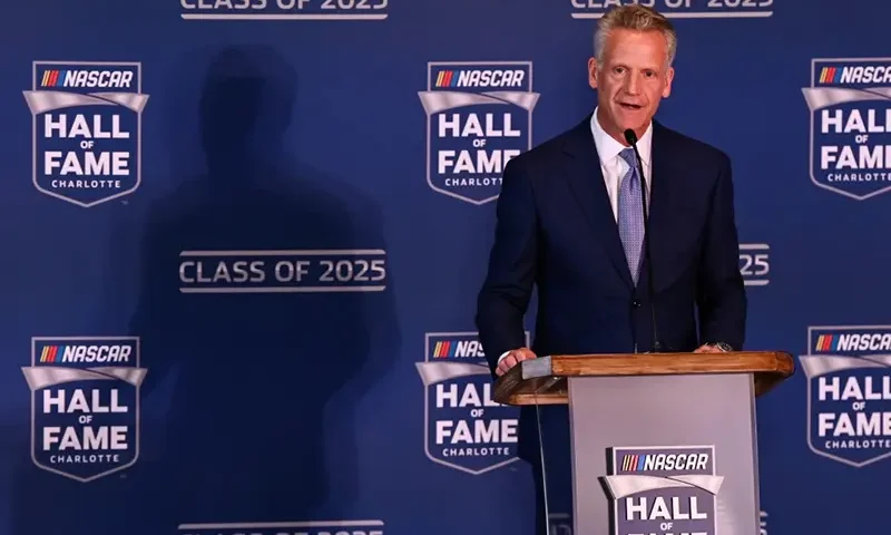 NASCAR president Steve Phelps announces the inductees to the 2025 NASCAR Hall of Fame class, Tuesday, May 21, 2024, in Charlotte, N.C. (AP Photo/Matt Kelley, File)