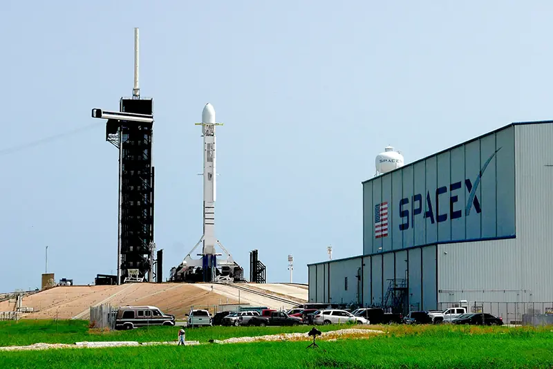 A Falcon 9 SpaceX rocket stands ready for launch at pad 39A at the Kennedy Space Center in Cape Canaveral, Fla., Friday, June 26, 2020. (AP Photo/John Raoux, file)