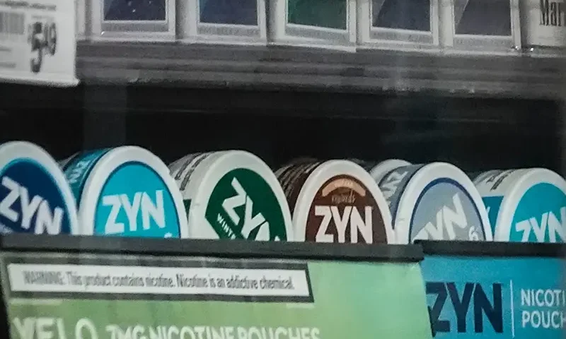 Containers of Zyn, a smokeless nicotine pouch, are displayed for sale among other nicotine and tobacco products at a newsstand on Feb. 23, 2024, in New York. (AP Photo/Bebeto Matthews, File)