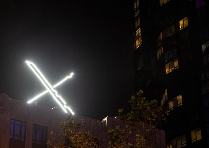 'X' logo is seen on the top of the headquarters of the messaging platform X, formerly known as Twitter, in downtown San Francisco, California, U.S., July 30, 2023. REUTERS/Carlos Barria/File Photo