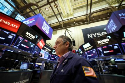 FILE PHOTO: Traders work on the floor of the New York Stock Exchange (NYSE) in New York City, U.S., August 15, 2023. REUTERS/Brendan McDermid