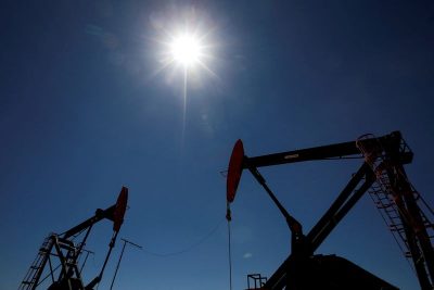 FILE PHOTO: Oil rigs are seen at Vaca Muerta shale oil and gas drilling, in the Patagonian province of Neuquen, Argentina January 21, 2019. REUTERS/Agustin Marcarian/File Photo